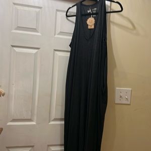 Roomy romper. Charcoal, new with tags